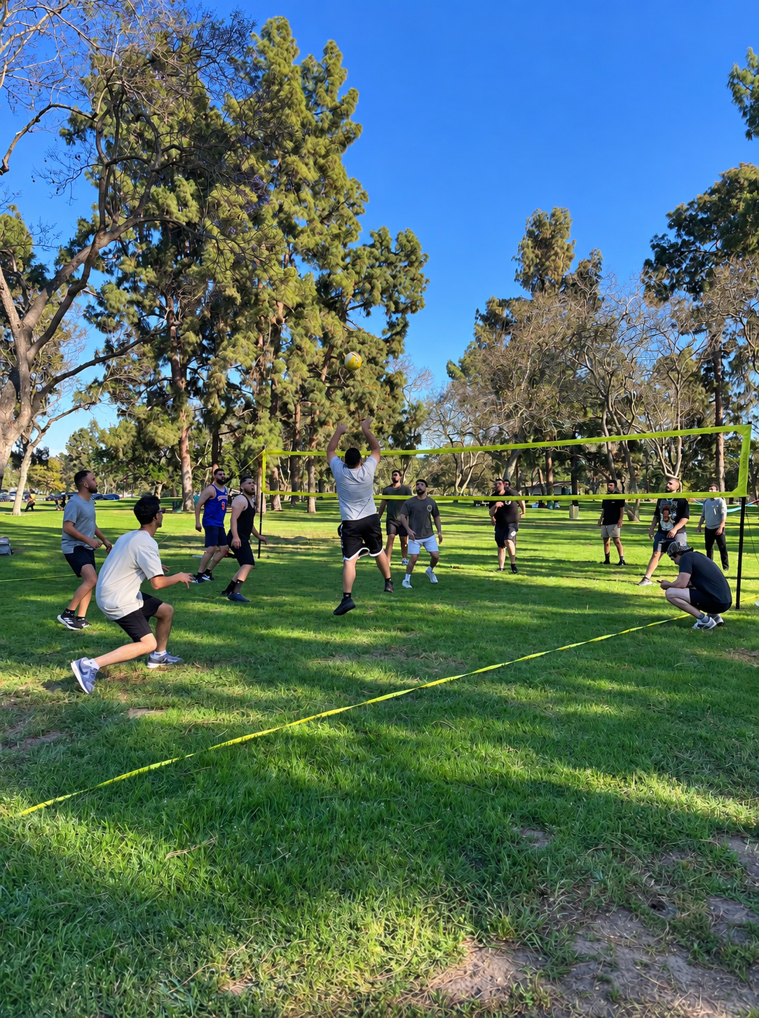 Community playing volleyball together